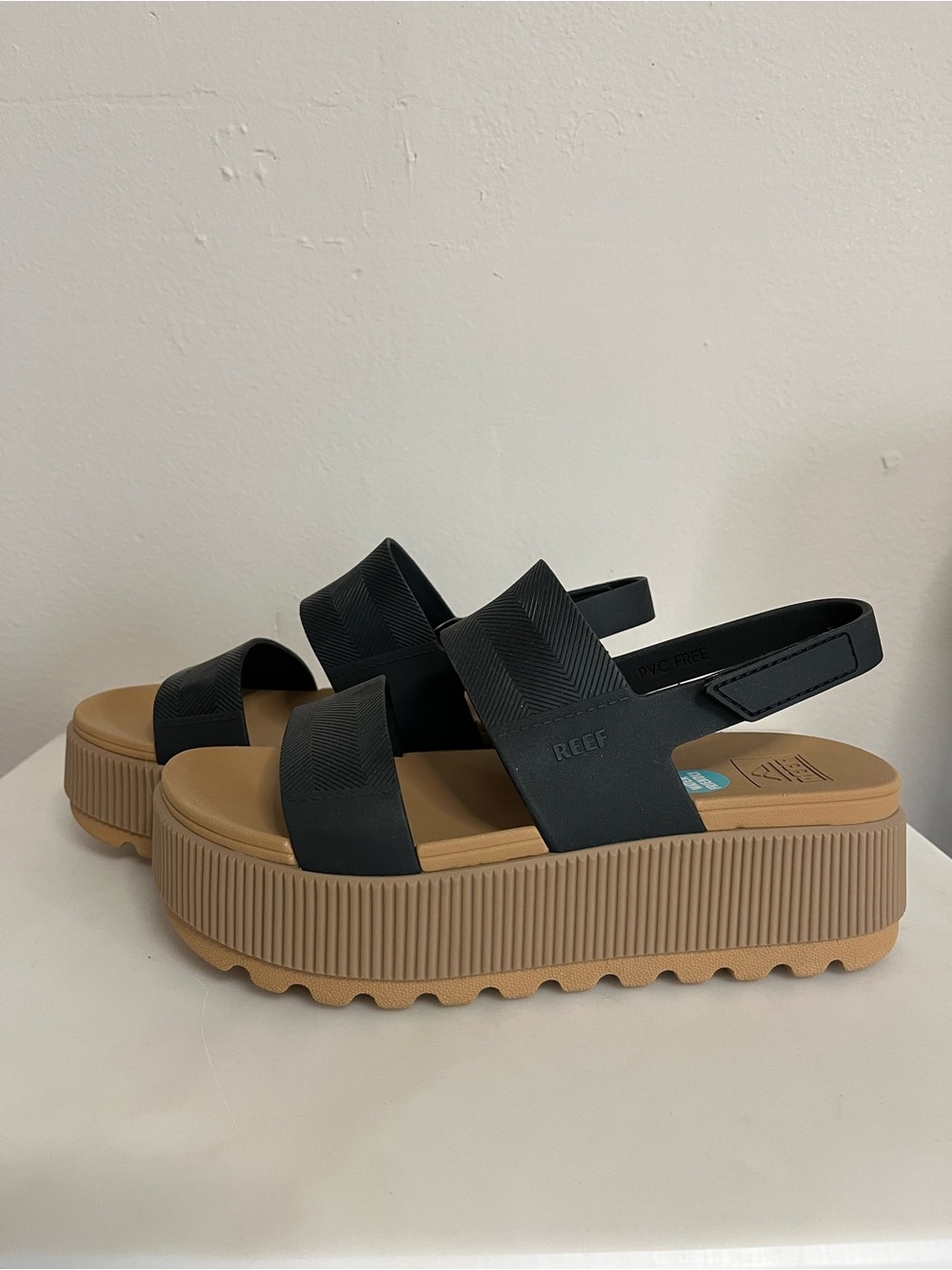 Reef Black Platform Sandals with Tan Sole